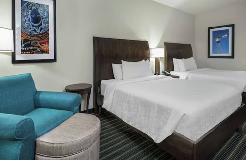 Far North Central Hotel | Escape to Comfort in a Quiet Room Near The Rim Shopping Center - 0.7 miles