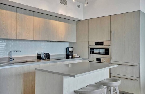 Hollywood South Central Beach Apartment | Experience coastal elegance with breathtaking bay views, modern décor, and unparalleled luxury