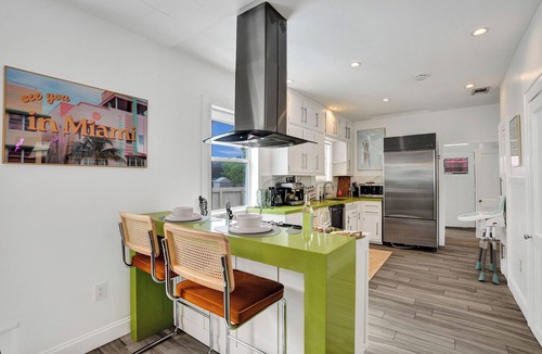 The Roads House | Experience Local Charm Miami in our Billiards Retreat with a Pool in Brickell!