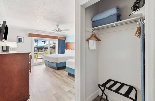 Neptune Beach Hotel | Family Seaside Haven: 3 Comfortable Rooms | Outdoor Pool | Pet-Friendly