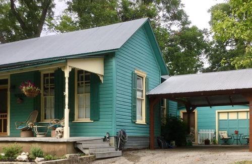New Braunfels Cottage | Feel local! A Football Field Stroll to Downtown & the River! Pets encouraged!