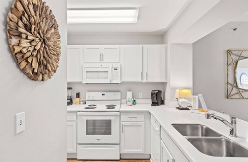 Waterside Village Condo | First Floor Condo Walk to Beach Sleeps 4