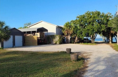 Florida Panhandle RV Rental | Florida Waterfront RV site on the eastern shore of Escambia Bay Endless Sunsets.