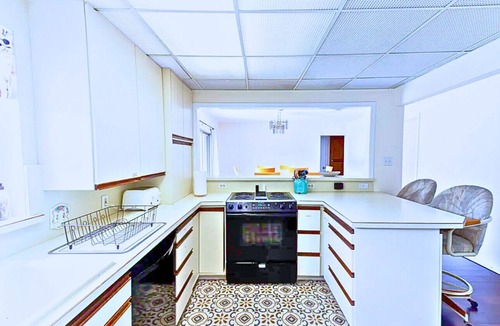 Keller House | Fort Worth Home near TX Speedway | Arcade Ping-Pong Game Room | Shared Pool Area