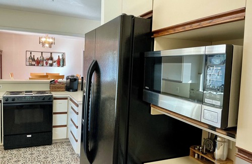 Keller House | Fort Worth Home near TX Speedway | Arcade Ping-Pong Game Room | Shared Pool Area