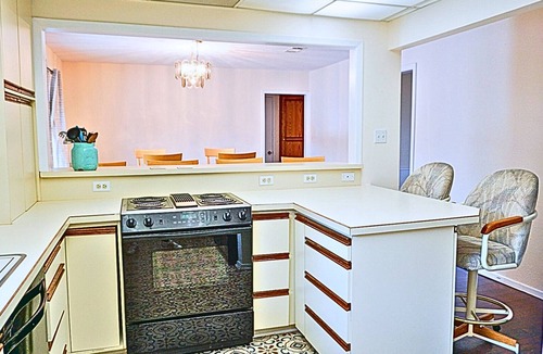Keller House | Fort Worth Home near TX Speedway | Arcade Ping-Pong Game Room | Shared Pool Area