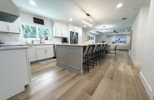 Jupiter House | Fresh Remodel Jupiter Retreat: 4BR Family Oasis - Heated Pool - Putting Green