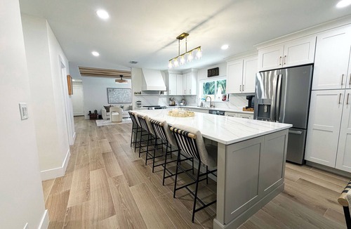 Jupiter House | Fresh Remodel Jupiter Retreat: 4BR Family Oasis - Heated Pool - Putting Green