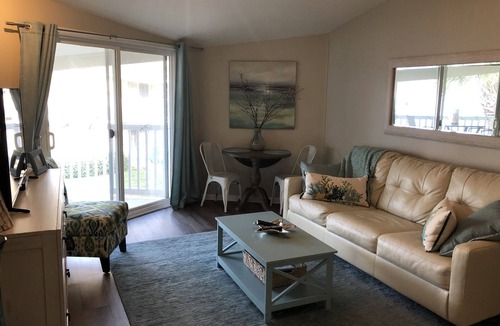 Villa Sabine Condo | Gorgeous waterfront condo steps from the beach!