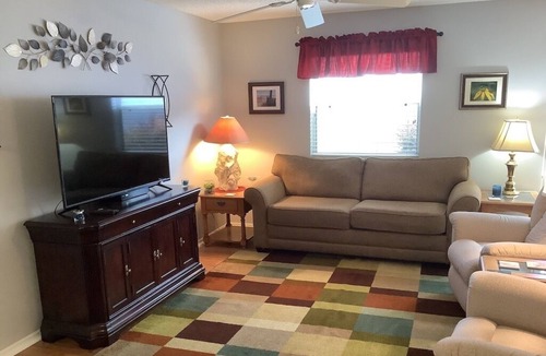 Liberty Park Villa | Great Location! 2 Bdrm villa with GAS GOLF CART, BBQ & FREE WiFi included!