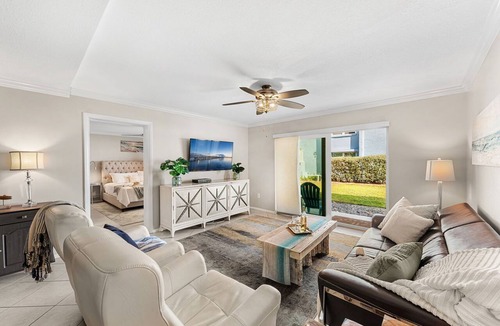 South Patrick Shores Condo | Ground Floor Beachfront Coastal Getaway w/Pool & Beach Views