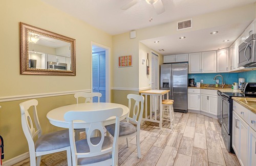 Cape Caneveral Beach Gardens Condo | Ground floor condo w/shared pool, fast WiFi, central AC, near beach access