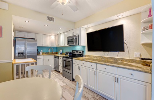 Cape Caneveral Beach Gardens Condo | Ground floor condo w/shared pool, fast WiFi, central AC, near beach access