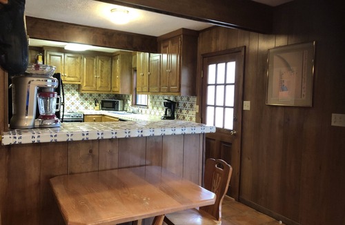 New Braunfels Cabin | Guadalupe River Road Retreat Southwestern Cabin