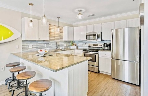 Gulf Place Condo | Gulf Place Oceanview Condo — Sleeps 10, Heated Pool & Steps to Beach