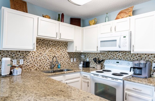 Crystal Beach Condo | Gulf view, direct beach access, heated pool, hot tub