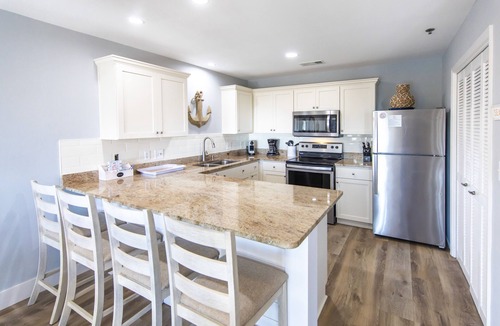 Gulf Place Condo | Gulf view, private beach, community pool, walk to shops and restaurants!