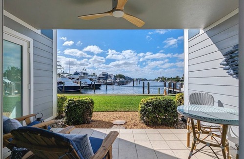 Moorings Condo | Harbor view, sunsets and a short walk to private beach access, we have it all!