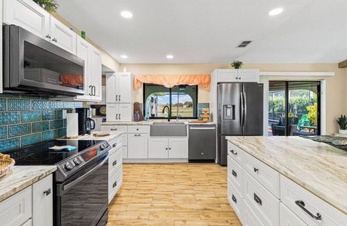 Punta Gorda House | Heated pool and spacious lanai! 3br home in Punta Gorda, 2 acres with pond