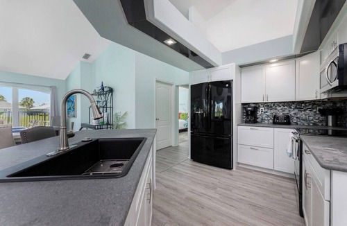 Broadmoor House | Heated Pool and Stunning Views: Waterfront Retreat Perfect for Groups up to 8