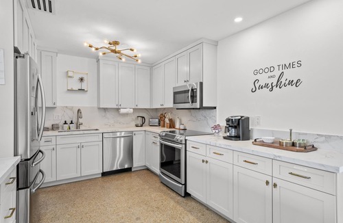 Wilton Manors House | Heated Pool, Outdoor Movie Theater, Gym, Sauna, EV Charger | Near Wilton Drive