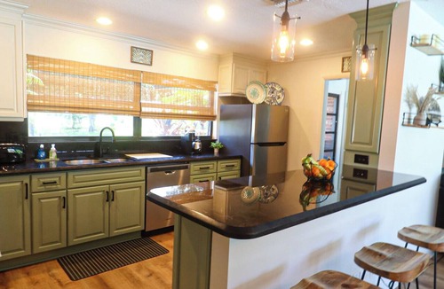 Florida North Atlantic Coast House | Heated pool, Putting Green, propane fire pit, outdoor shower waterfront home 4 U
