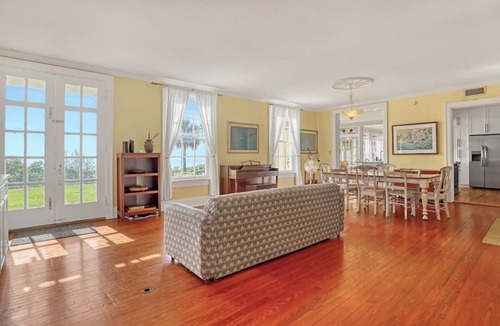 Tropic House | Historic Riverfront Estate | 11bed/10bath Dock Sleeps 32 | The Ballard House