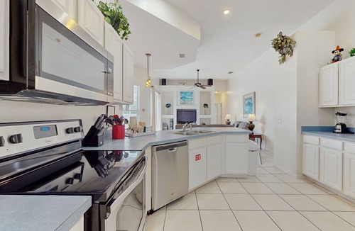 Westridge House | Home near Disney/golf with screened pool, spa, pool table, foosball, AC, & W/D