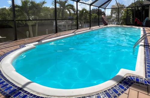 Port Charlotte House | House With A BoatYour Private Waterfront Resort