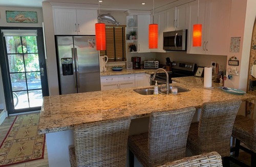 Key Largo House | Impeccable interior, waterfront w/dock + 28' slip. April 2026 still available