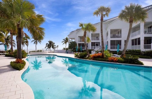Islamorada Condo | Islamorada's Poolside Maison 302, a spacious 3BR condo with resort-style pool in scenic Islamorada.