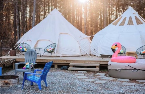 Thomson RV Rental | Kettles Corner Yurt with llamas, fluffy cows, and snuggly sheep