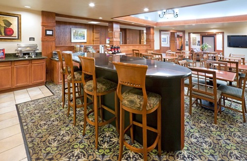 Tech Terrace Condo | King Suite. Shared Pool & Hot Tub. Free Breakfast. Near Texas Tech University & University Medical Center.