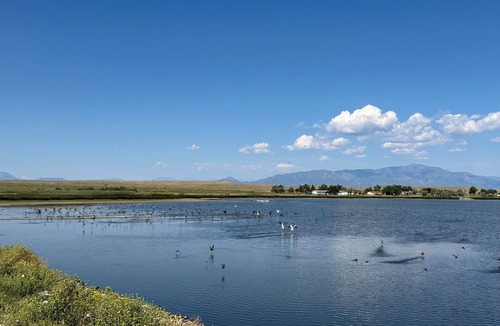 Walsenburg RV Rental | Lake front RV site with stunning views of the Spanish Peaks