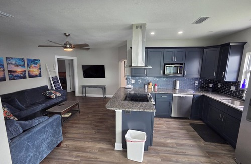 Winter Haven House | Lakefront 3 story 5/3 bungalo with huge yard, great views, a firepit and a dock.