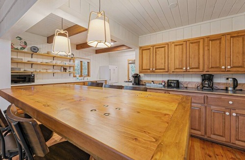 Tiger House | Lakefront 4BR, 4.5BA retreat with boathouse, fire pit, and serene Lake Burton views.