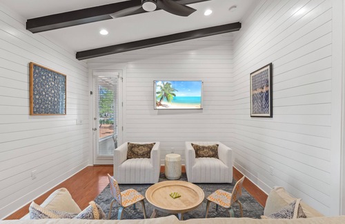Laurel Grove House | Lakefront Beach Cottage w/ 2 Golf Carts, Lake Views, Pool, Beach, Beach Tram.