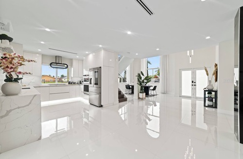 Ludlam House | Lakefront Lux Villa w/Games, Spa, BBQ, Pool & Fun