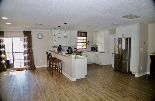 Eustis House | Lakefront Paradise Sauna Hot Tub Jet Skis Sunset Views