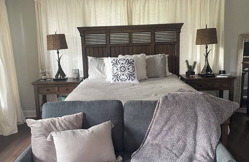 Myrick Estates House | Lakefront - private suite & entrance to one bedroom & private bath- hot tub