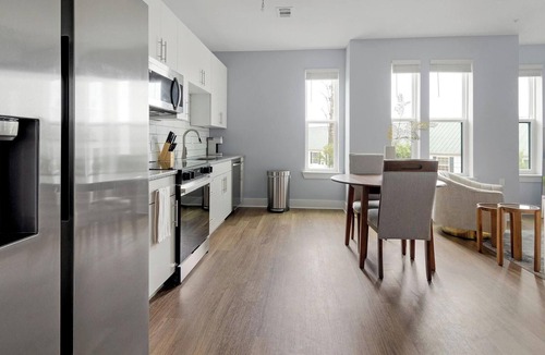 Sports Complex Apartment | Landing | Chic Studio, Clubhouse, Courtyard