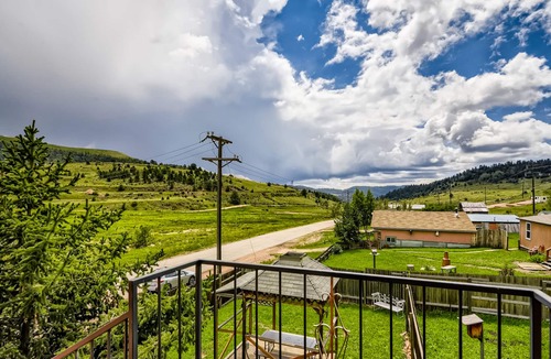 Cripple Creek House | Landmark home built in 1895 with porches, office & western-themed decor