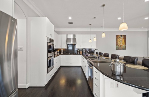 Greenway Plaza-Upper Kirby House | Luxe Kirby Retreat. Heated Pool, King Suites & Games. Secluded, Central Setting