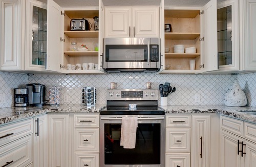Deerfield Beach House | Luxurious private home with heated pool & spa . Five min to beach. Work space