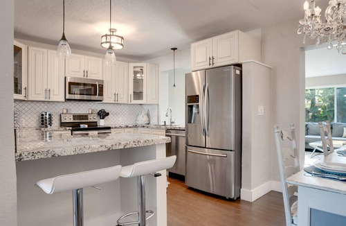 Deerfield Beach House | Luxurious private home with heated pool & spa . Five min to beach. Work space