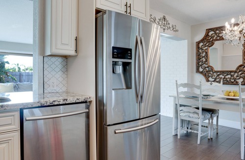 Deerfield Beach House | Luxurious private home with heated pool & spa . Five min to beach. Work space