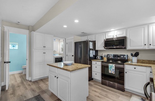 Fort Walton Beach House | Luxury Beachfront Home, Sleeps 12, Kayaks, SUPs, & Beach Gear + 4 Parking spots
