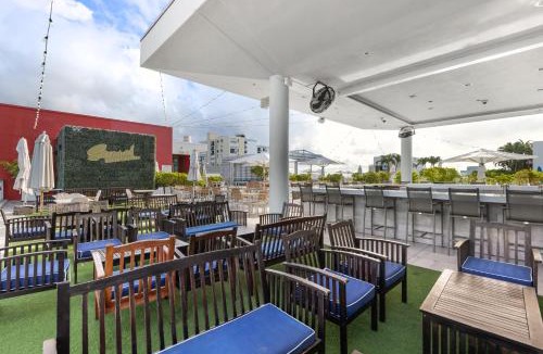 Hollywood Apartment | Luxury Condo with Serene Balcony View