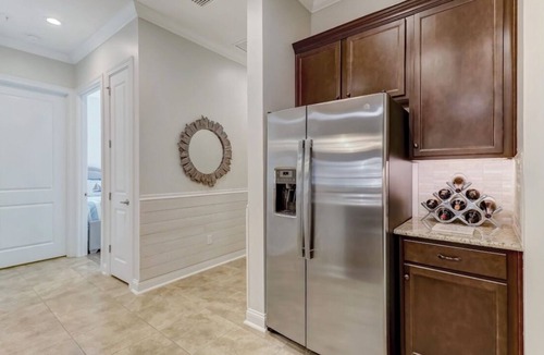 American Beach Condo | Luxury ground level condo. Golf cart, bikes, included.