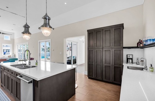 Coury House | Luxury Key Colony Beach Home | Coral Pool, Rooftop Deck + Ocean Access Dock